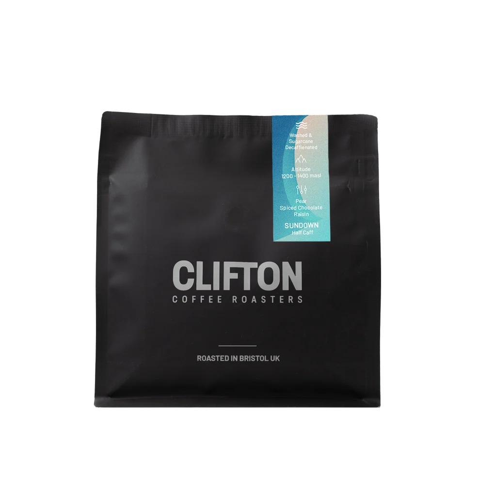 Black Clifton Coffee Roasters bag with a blue Sundown Half Caff label